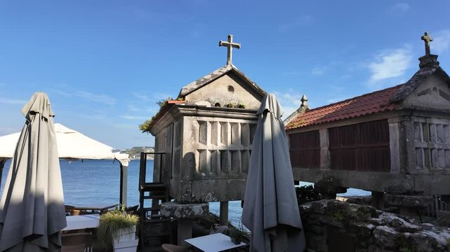 Combarro, horreos and stone crosses overlooking peaceful water in galicia, spain