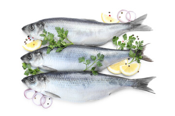 Salted herrings and spices on white background, top view