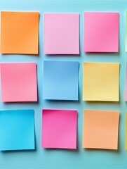 Fototapeta premium Colorful Notes: A vibrant array of sticky notes, each a different hue, forms a grid against a refreshing backdrop, inviting creativity and organization.