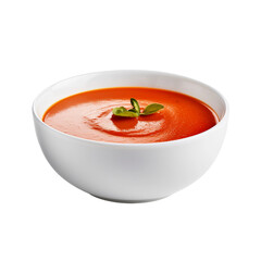 tomato soup with basil in bowl on white background
