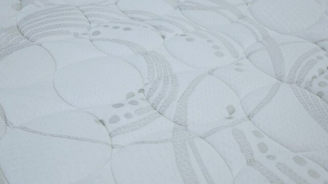 Close up of surface of white mattress