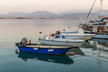 Seafront near the embankment of the Fethiye city. Boats in the center. Mugla Province, Turkey