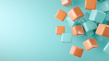 Obraz premium An arrangement of shiny square blocks in vibrant colors contrasts beautifully against a turquoise background, creating a dynamic and energetic composition that captivates viewers.