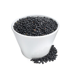 Black lentils in bowl isolated on white