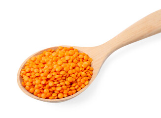 Raw lentils in wooden spoon isolated on white