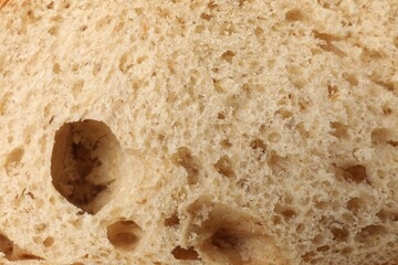 Freshly baked bread as background, closeup view