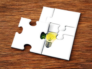 Creative Idea Represented Puzzle Pieces on Wooden Surface. A symbolic representation of creativity...
