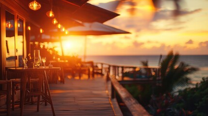 Romantic sunset oceanfront restaurant patio.