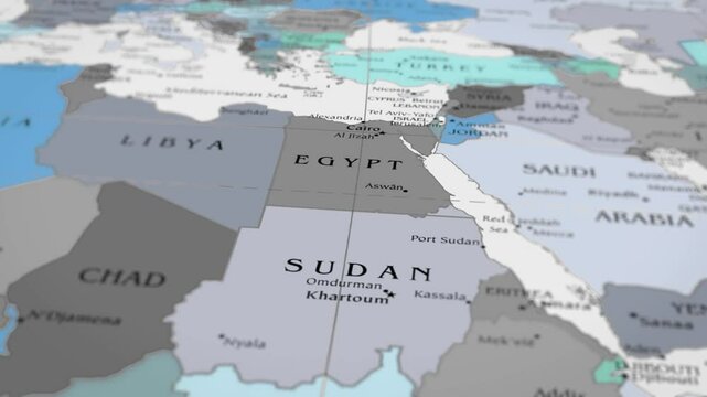 The camera rotating around sudan on the world map takes the focus.  4K Map Animation.