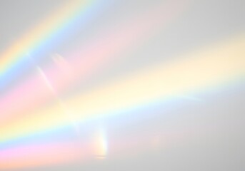 Abstract rainbow light effect on white background, colorful prism, light beams.