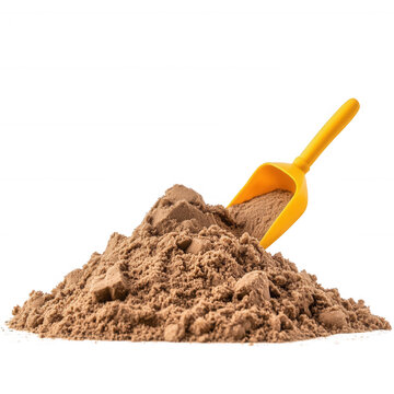 A pile of sand with a bright yellow shovel resting on top, perfect for beach play or construction activities.