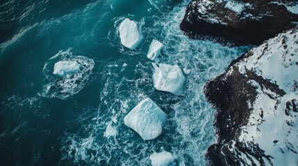 Fototapeta premium Breathtaking view of icy shores with floating icebergs. The deep blue ocean contrasts beautifully with white ice. Nature at its most serene. Generative AI