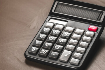 Obraz premium School calculator on dirty chalk divorce board.