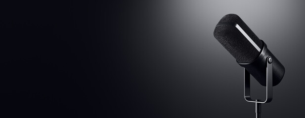 Professional black microphone with spotlight on dark gradient background for podcast, audio recording or media technology business concept. 3D Rendering