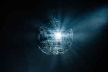 Disco ball reflection of light at night. Party, birthday and holiday concept.