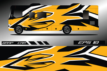 Vibrant yellow and black wrapped RV showcasing dynamic graphic design against a sleek background