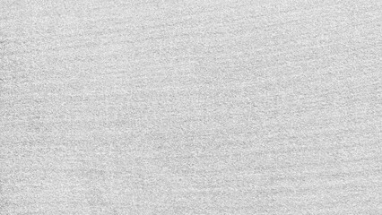 A white gray texture background with a few small dots.  background is white and the dots are scattered all over it