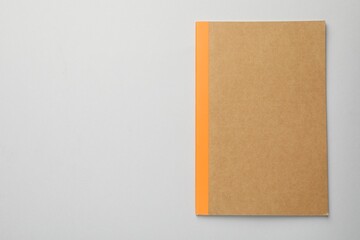 One copybook on grey background, top view. Space for text