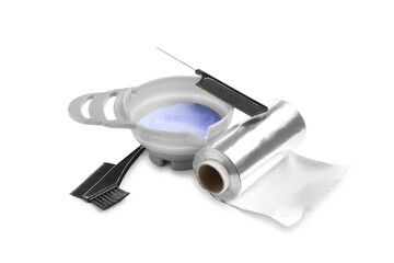 Bleaching powder and hairdresser's tools isolated on white