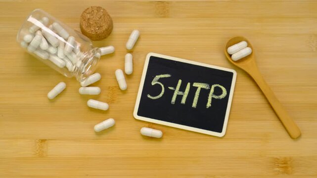 5-HTP sleep supplement capsules. Selective Focus.