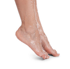 Woman with body scrub on her feet against white background, closeup