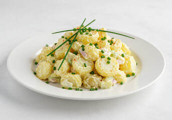 Creamy Potato Salad with Chives on White Plate