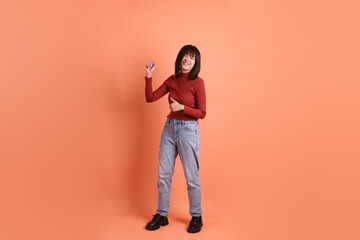 Fototapeta premium 20s woman in red long sleeve t-shirt