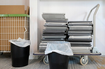 Electronic waste - stack of laptops to be discarded