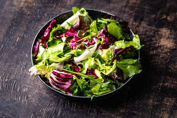 Bowl of fresh green salad mix