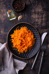 Spicy korean carrot salad in plate
