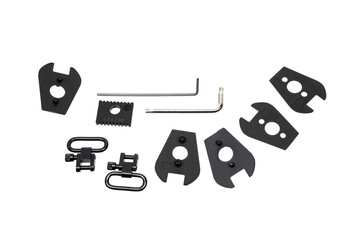 A set of black plastic spacers, swivels, and wrenches for firearm assembly and disassembly, isolated on a white background.