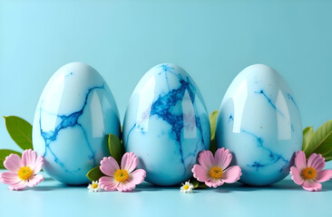 Fototapeta premium Happy Easter. Blue marble Easter eggs with flowers on pastel blue background. Selective focus