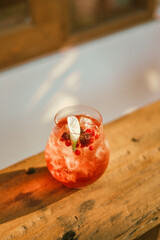 Close up strawberry soda on wood table