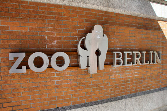 Berlin Zoo Logo with Gorilla Silhouette on Brick Wall Entrance