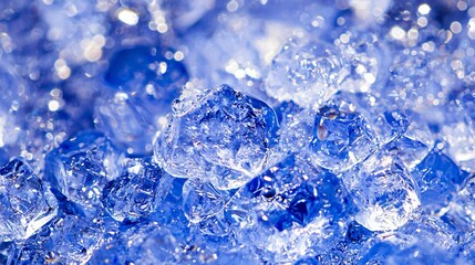 Close-up of shimmering blue ice crystals creating a captivating, textured surface.