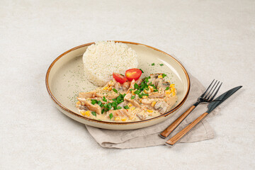 Portion of gourmet chicken fricassee with rice