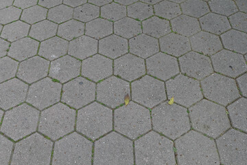 hexagonal outdoor paving geometric shapes pattern on sidewalk tile background texture