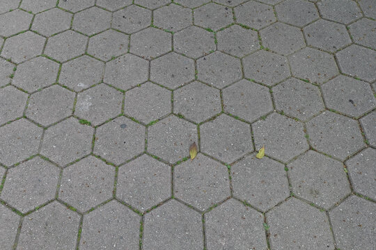 hexagonal outdoor paving geometric shapes pattern on sidewalk tile background texture