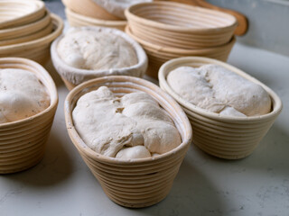 Sourdough Bread in Proofing basket, bannetons baskets for retarding raw dough before baking.