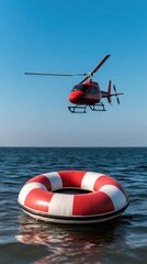 Naklejka premium A helicopter is gracefully hovering above the ocean, positioned close to a bright orange rescue buoy on a clear and sunny day