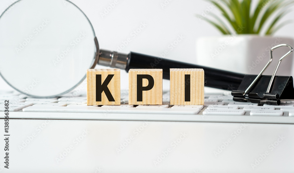 Poster kpi concept with blocks on keyboard for business analysis