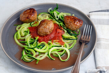 zucchini noodles with pasta sauce and meat balls