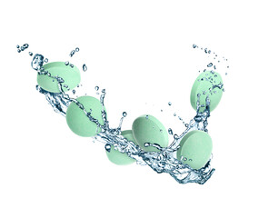 Many pills and splashes of water in air on white background
