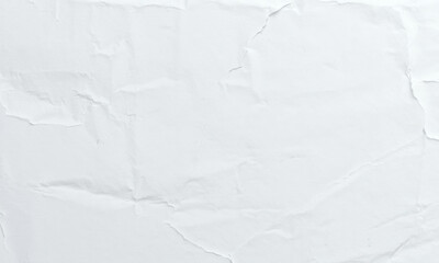 Obraz premium textured white paper background with subtle creases and folds, creating soft and neutral backdrop for various design projects. This versatile surface can enhance visual appeal