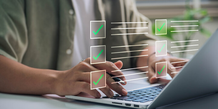 Digital to do list system displayed over user working on laptop, focusing on productivity, task management, and strategic planning for successful project execution in personal or business setting
