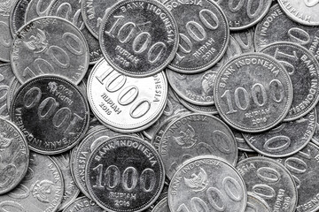 Pile of Indonesian 1000 Rupiah Coins. Obverse view of Indonesian Rupiah Coins in Close-Up