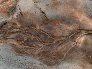 Aerial photograph of the river streams from rivers on dried up dam Liptovska Mara. Liptovsky Mikulas landspace, Slovakia