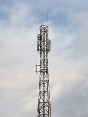 View of cell phone and radio transmitters telecommunication tower