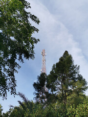 View of cell phone and radio transmitters telecommunication tower