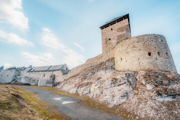 The medieval ruins of Regec Castle near tokaj region in Hungary on a hill surrounded by lush forests and valleys. Historical stone walls and towers.